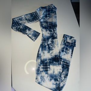 Jumpsuit very stretchy material fits super good. white & blue